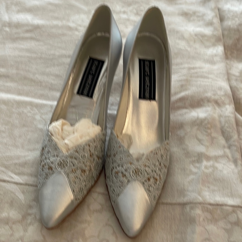 Stuart Weitzman, silver with lace, heels, never worn, 9AA